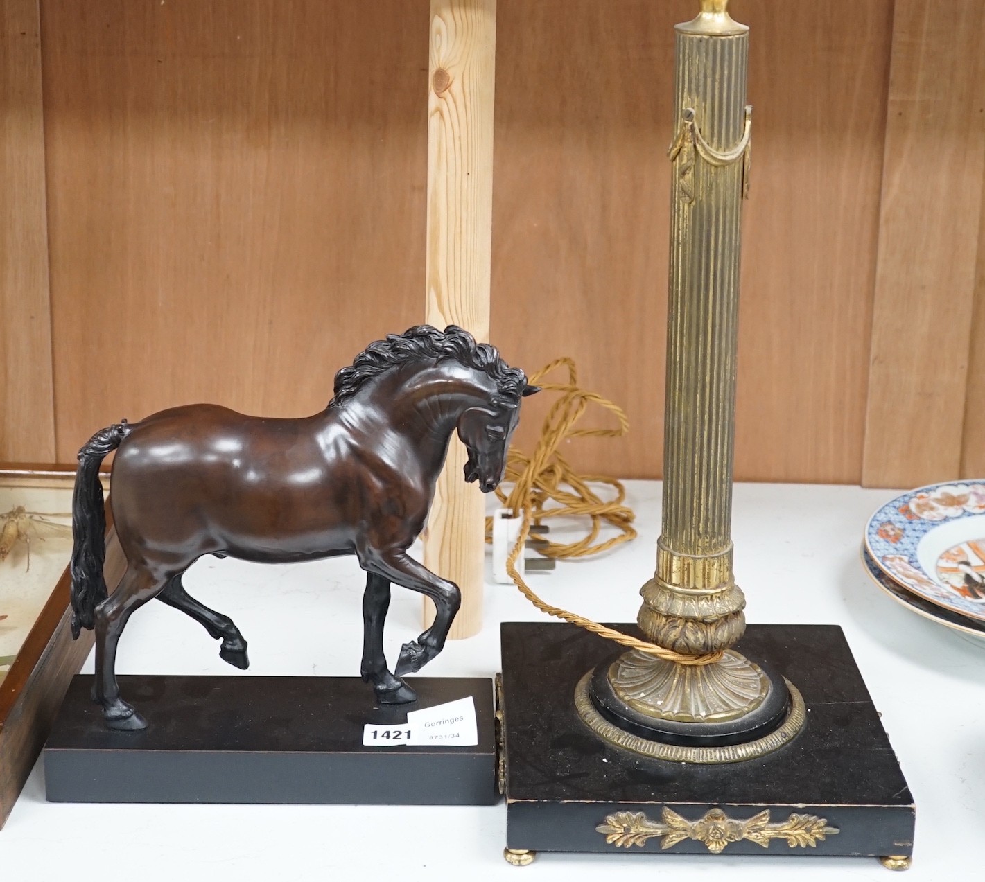 A reproduction bronzed figure of a horse, together with a column desk lamp, 53cm tall excl. light fighting